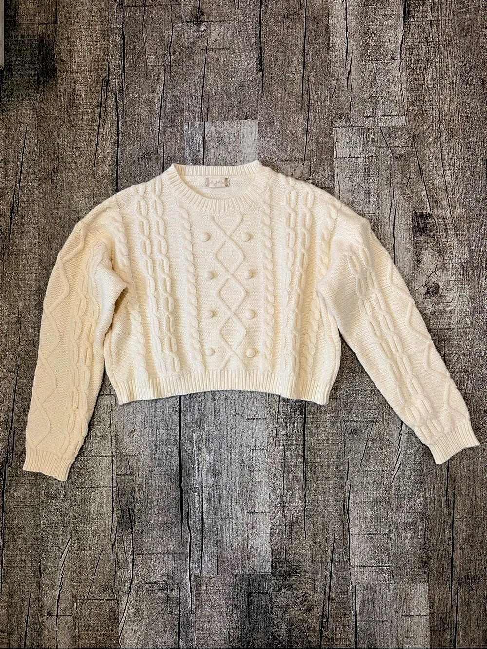 Altar’d State Cable Knit Cropped Sweater in Cream